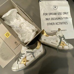 golden goose white & gold superstar sneakers